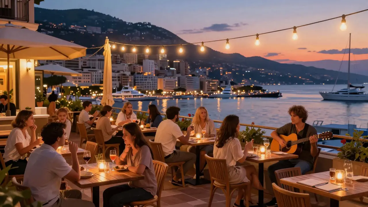 Cozy terrace at Le Rascasse with people enjoying wine and live acoustic music by the harbor.
